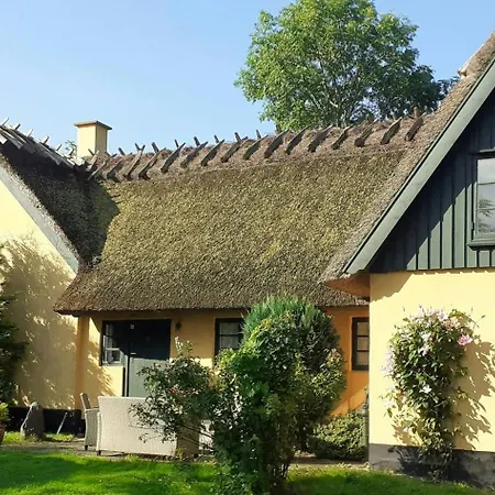 Idyllic Thatched On The Ridge Between Sea Areas