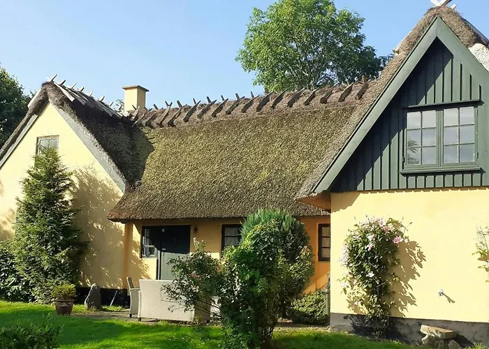 Idyllic Thatched On The Ridge Between Sea Areas